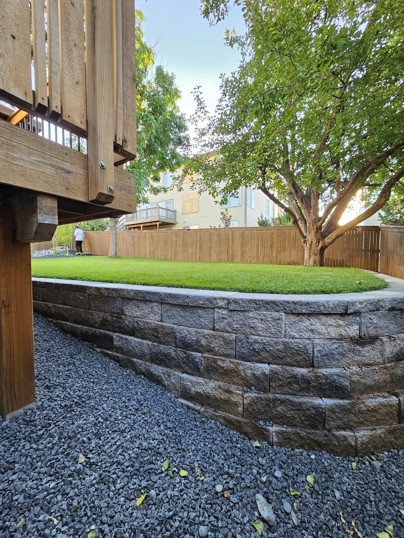Highlands Ranch retaining wall leveling sloped back yard
