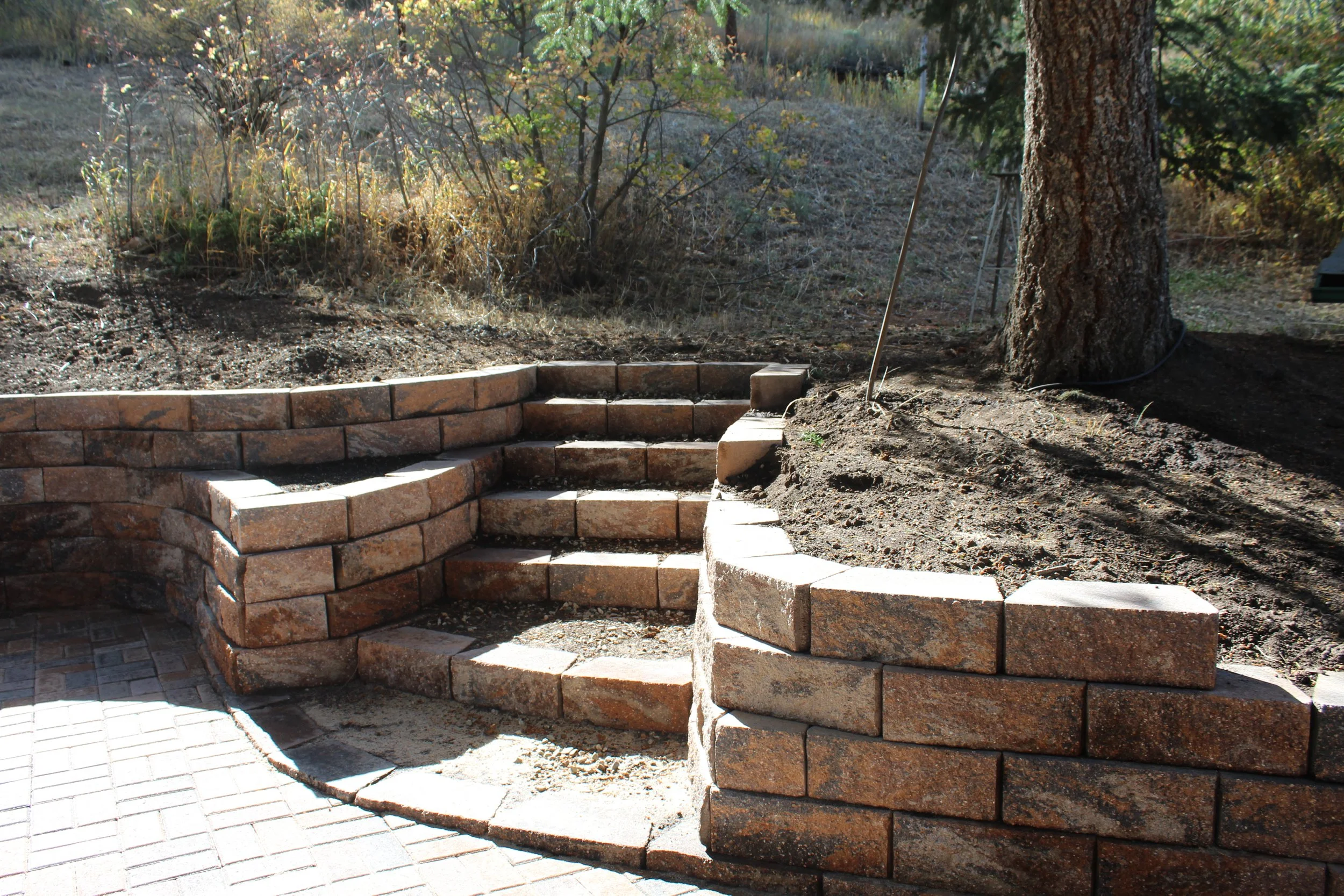 Shawnee retaining wall with planter and stair way 