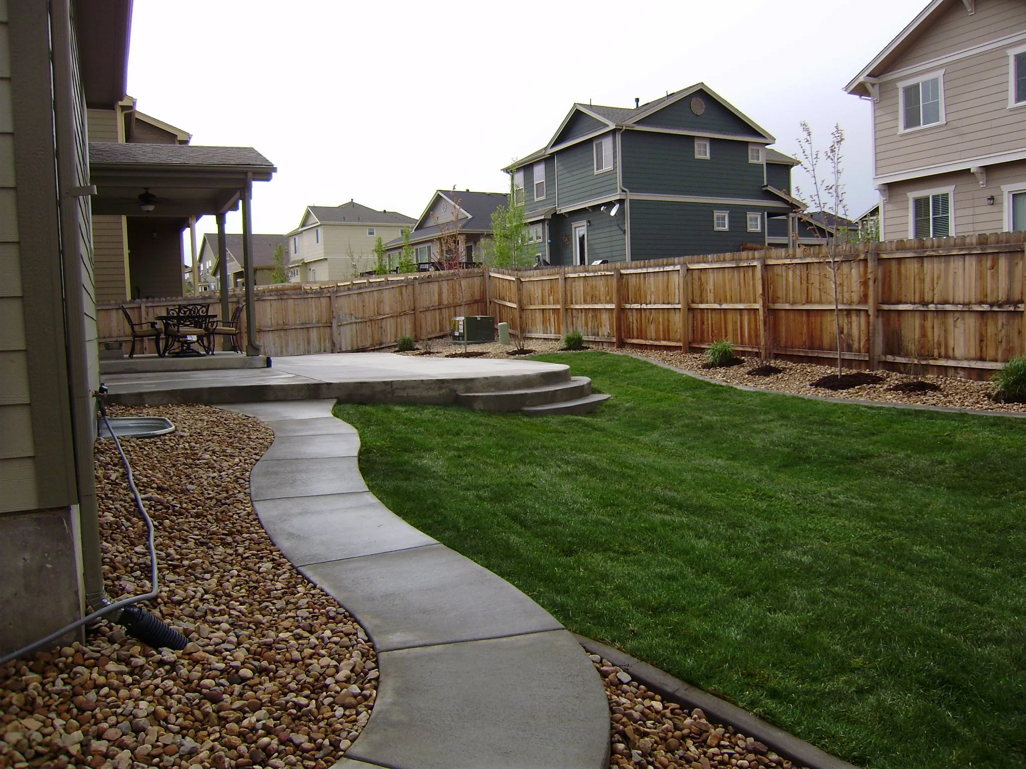 Thornton Backyard concrete patio and sod