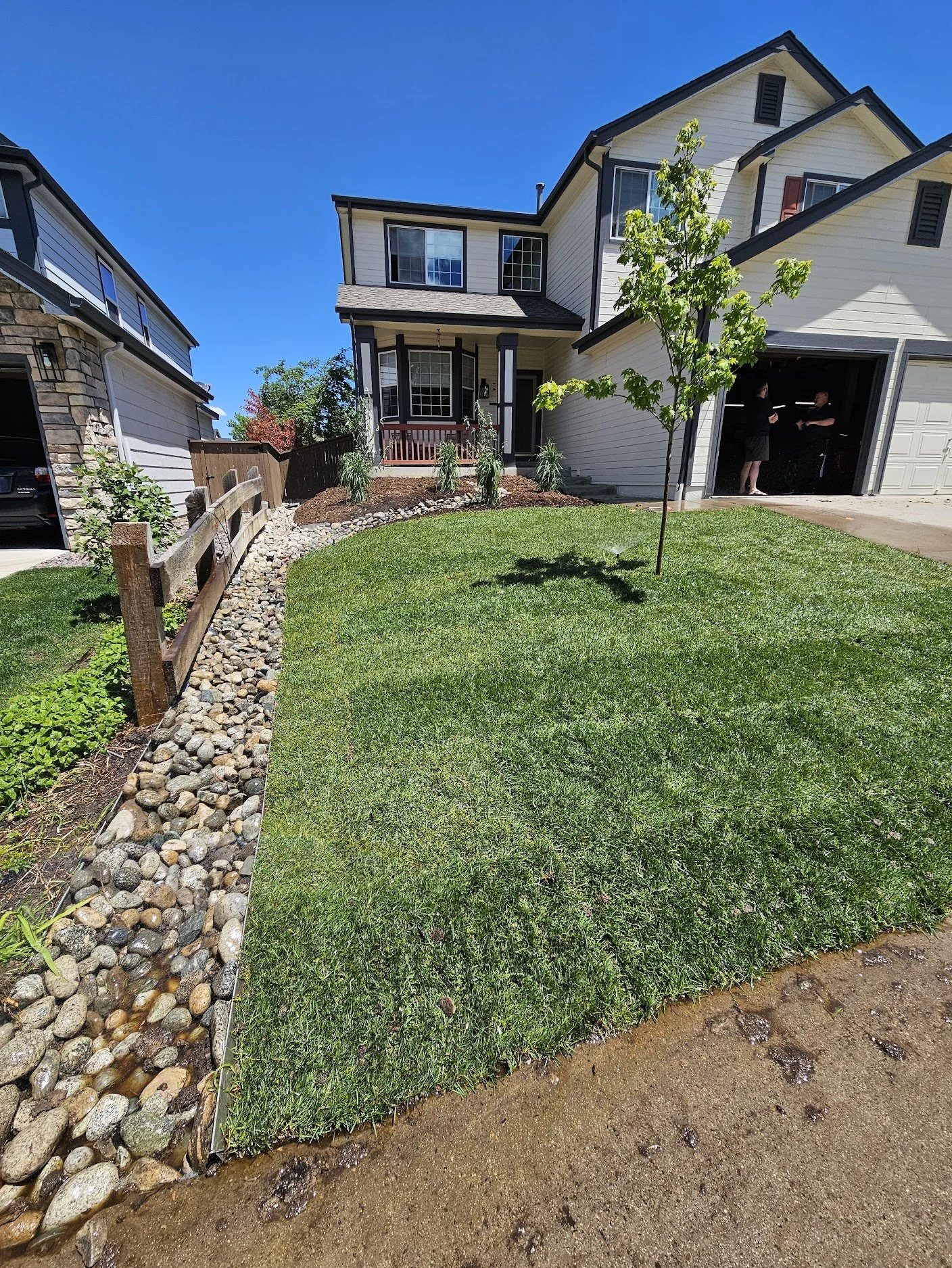 Highlands Ranch front yard sod tree and river rock