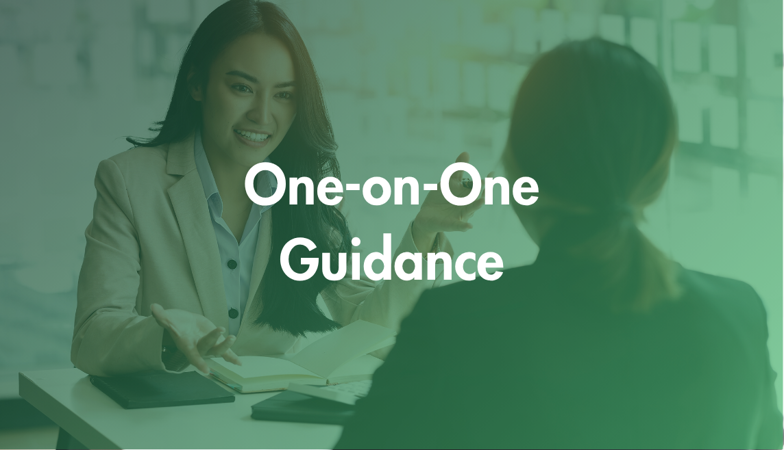 A woman in a beige blazer smiling and talking to another person in an office setting, with the text 'One-on-One Guidance' overlaid.