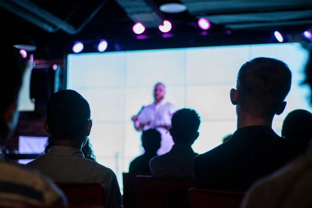 Men at a health retreat focused on Peyronie's disease recovery and reintegration