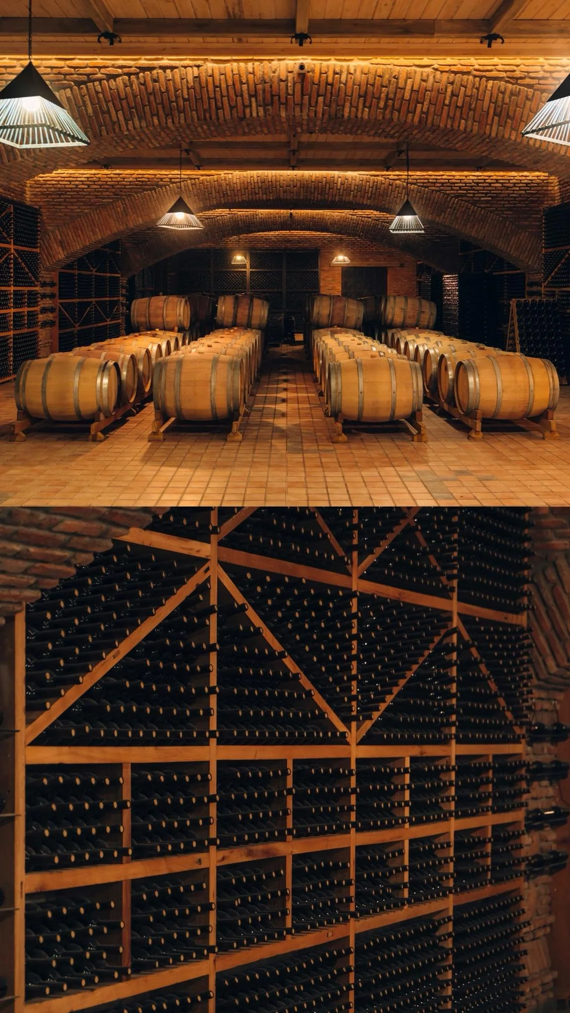 A wine cellar with rows of wine bottles stored on wooden racks, a brick ceiling with arched design, and warm lighting.