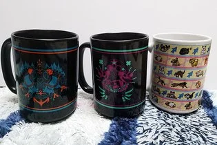 A set of three ceramic mugs with colorful decorative patterns. The first two mugs are black with fantasy-inspired designs in blue and purple, respectively. The third mug set includes four stacked mugs with lion, elephant, and other animal designs, in
