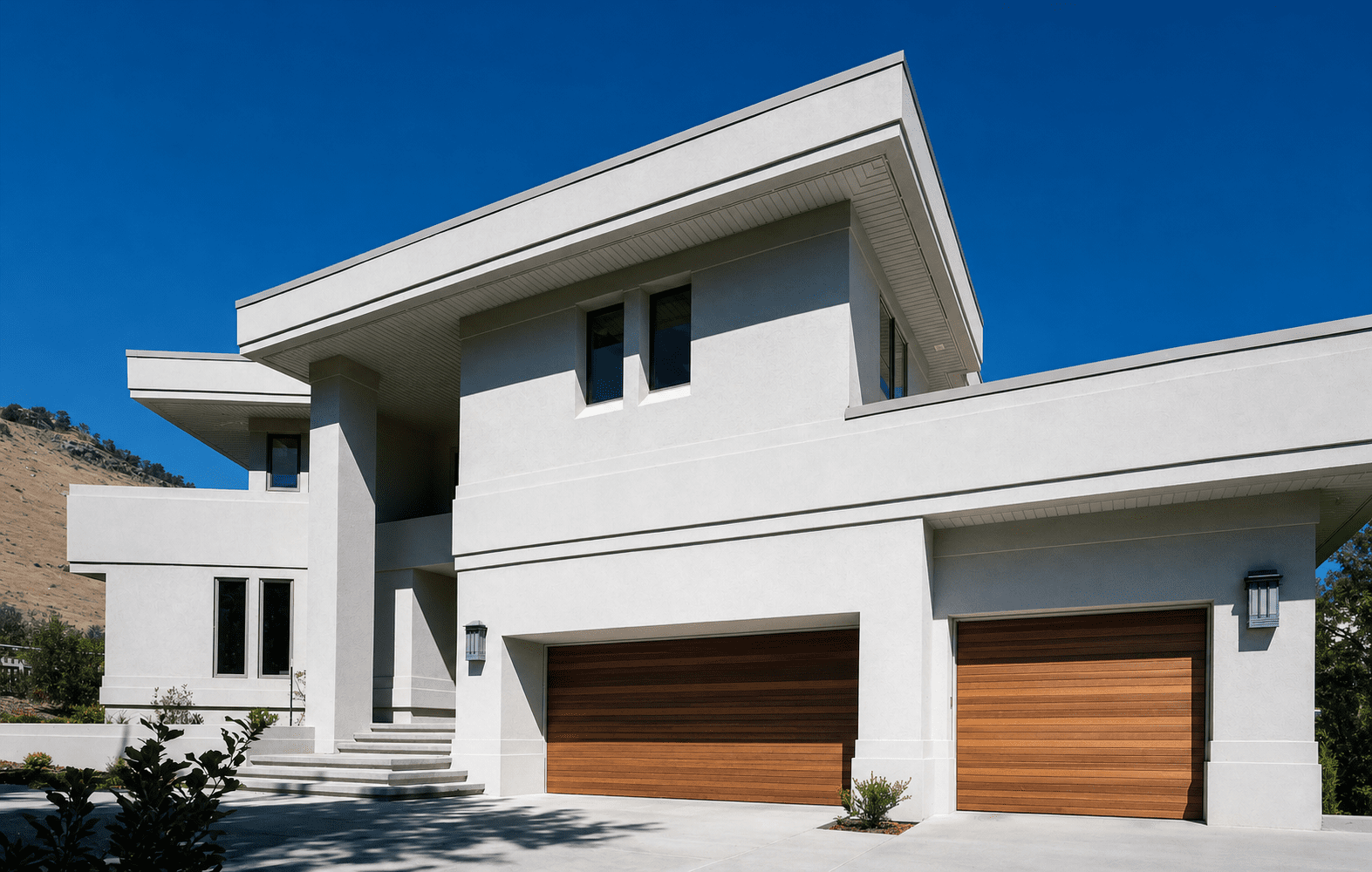 custom-home-exterior-redwood-garage-doors-north-boulder-co.png