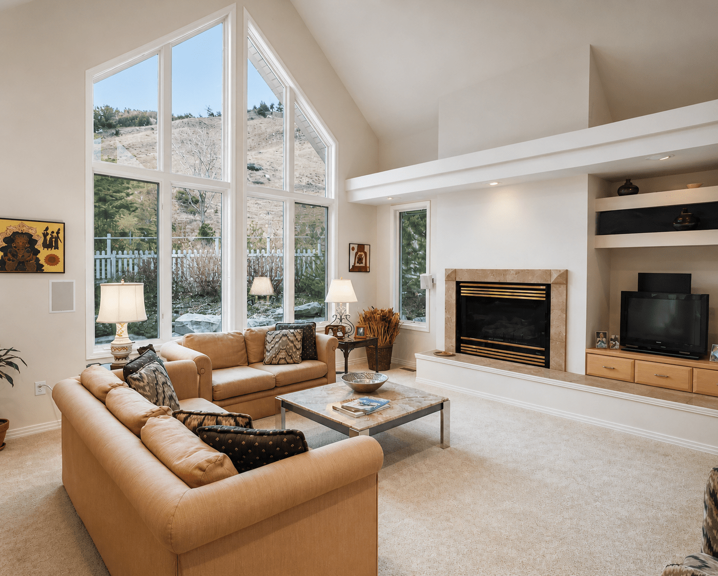 family-room-vaulted-windows-fireplace-north-boulder-co.png