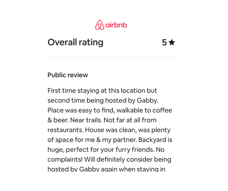 Screenshot of an Airbnb guest review with a five-star rating, describing a positive stay including details about the location, cleanliness, and host.