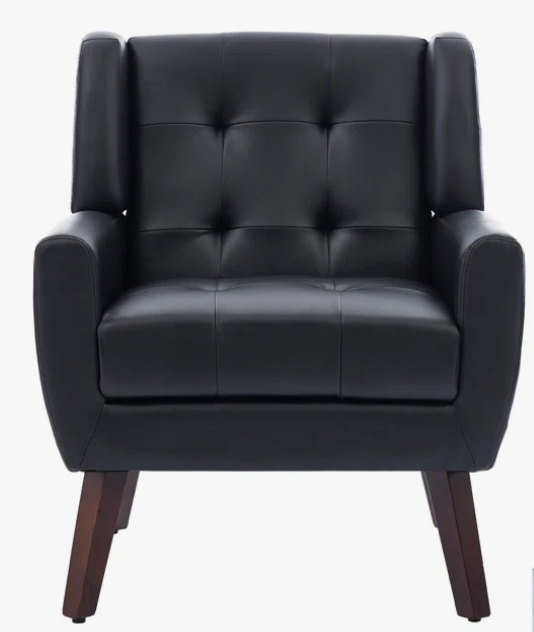 black faux leather tufted chair