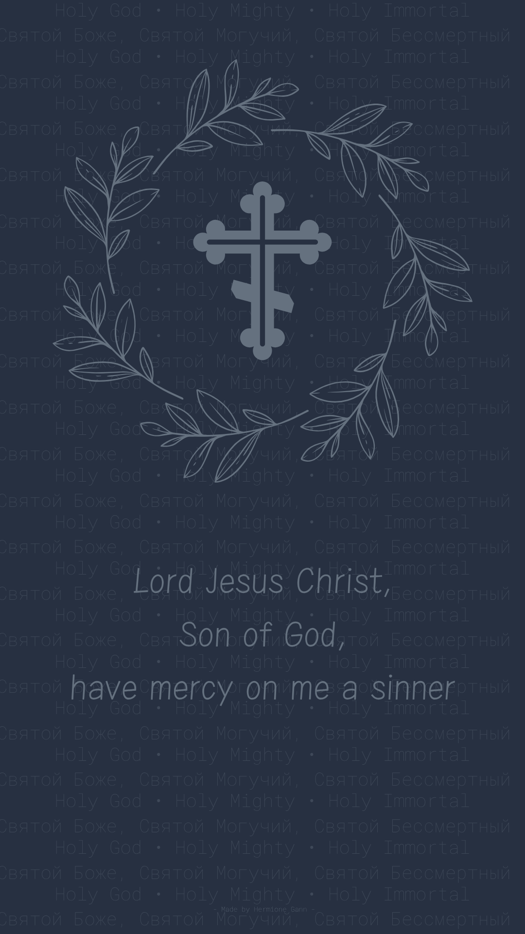 A dark background with a white Christian cross surrounded by a wreath of leaves. Text reads: "Lord Jesus Christ, Son of God, have mercy on me a sinner."