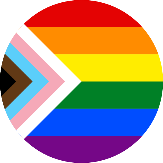 A circular design features the progression of the Progress Pride flag, with a chevron of brown, light blue, pink, white, light brown, and turquoise on the left side, followed by rainbow stripes from red to purple.
