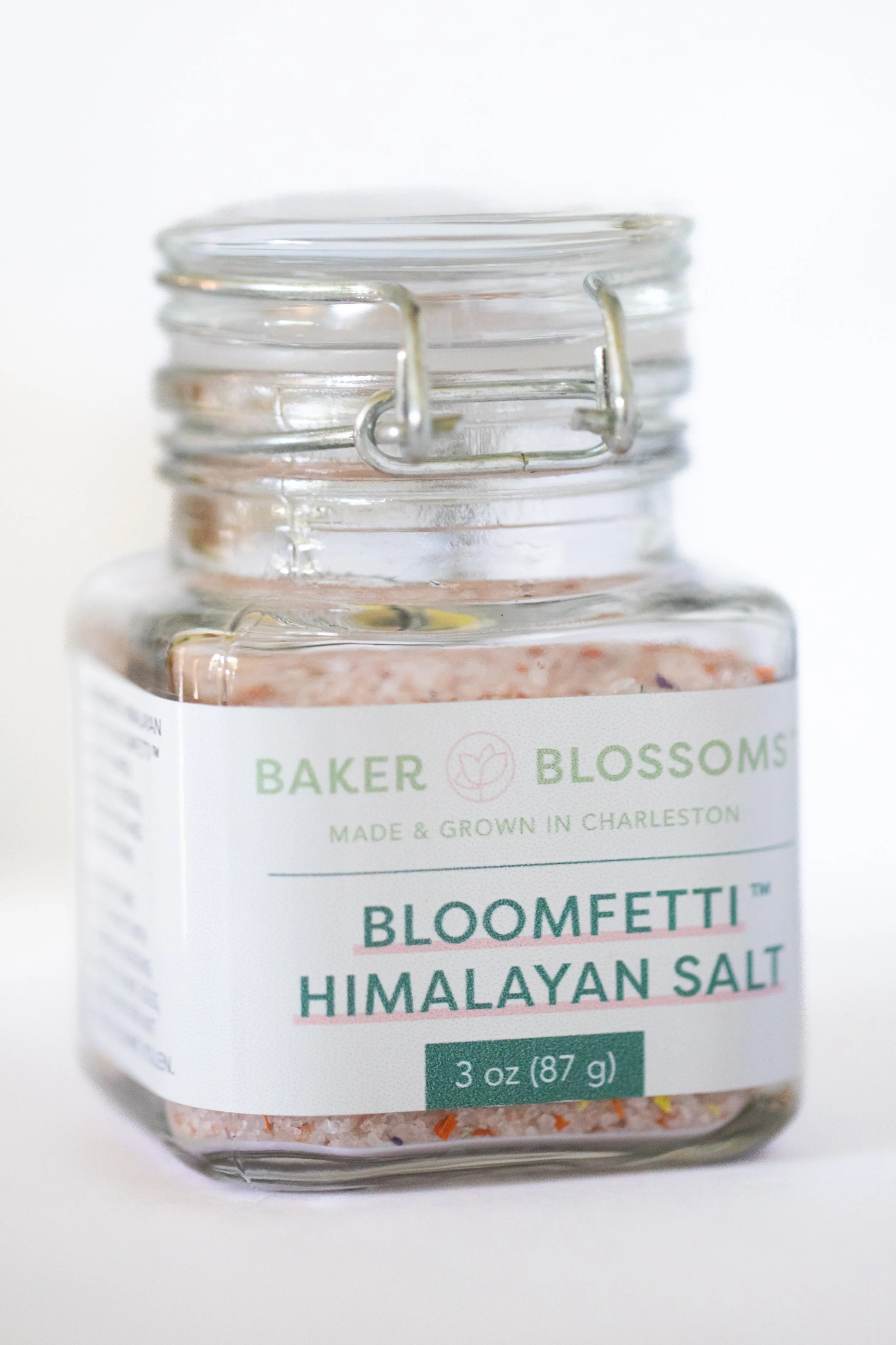 Bloomfetti Himalayan salt infused with edible flowers by Charleston pastry studio—available for wholesale to local shops for cocktails, mocktails, and gourmet goods