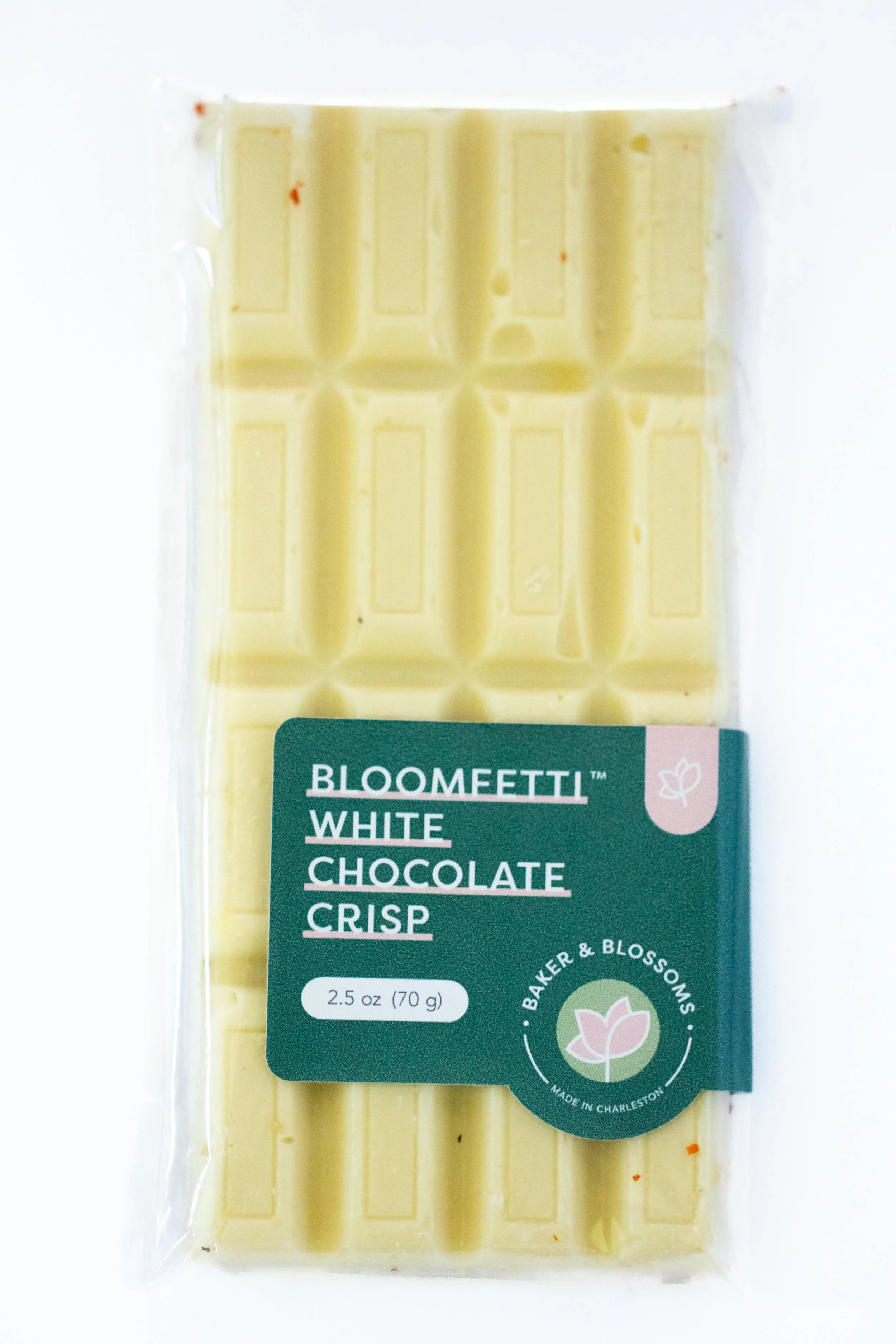 Edible flower infused white chocolate bars by Charleston pastry studio—available for wholesale to local shops and gourmet retailers