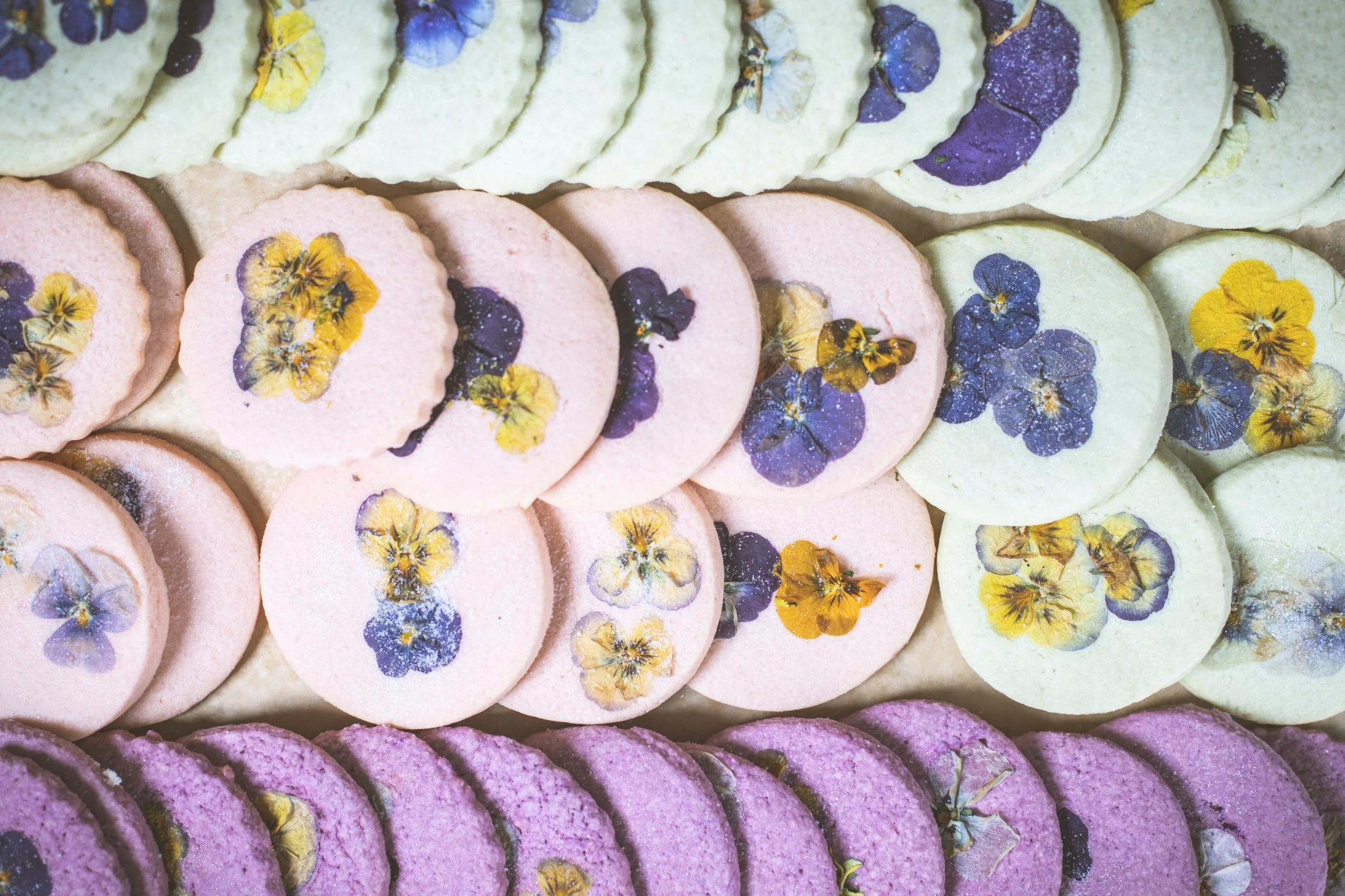 Artisanal flower pressed cookies from Charleston pastry studio—perfect for weddings, bridal showers, private events, and local corporate gifting