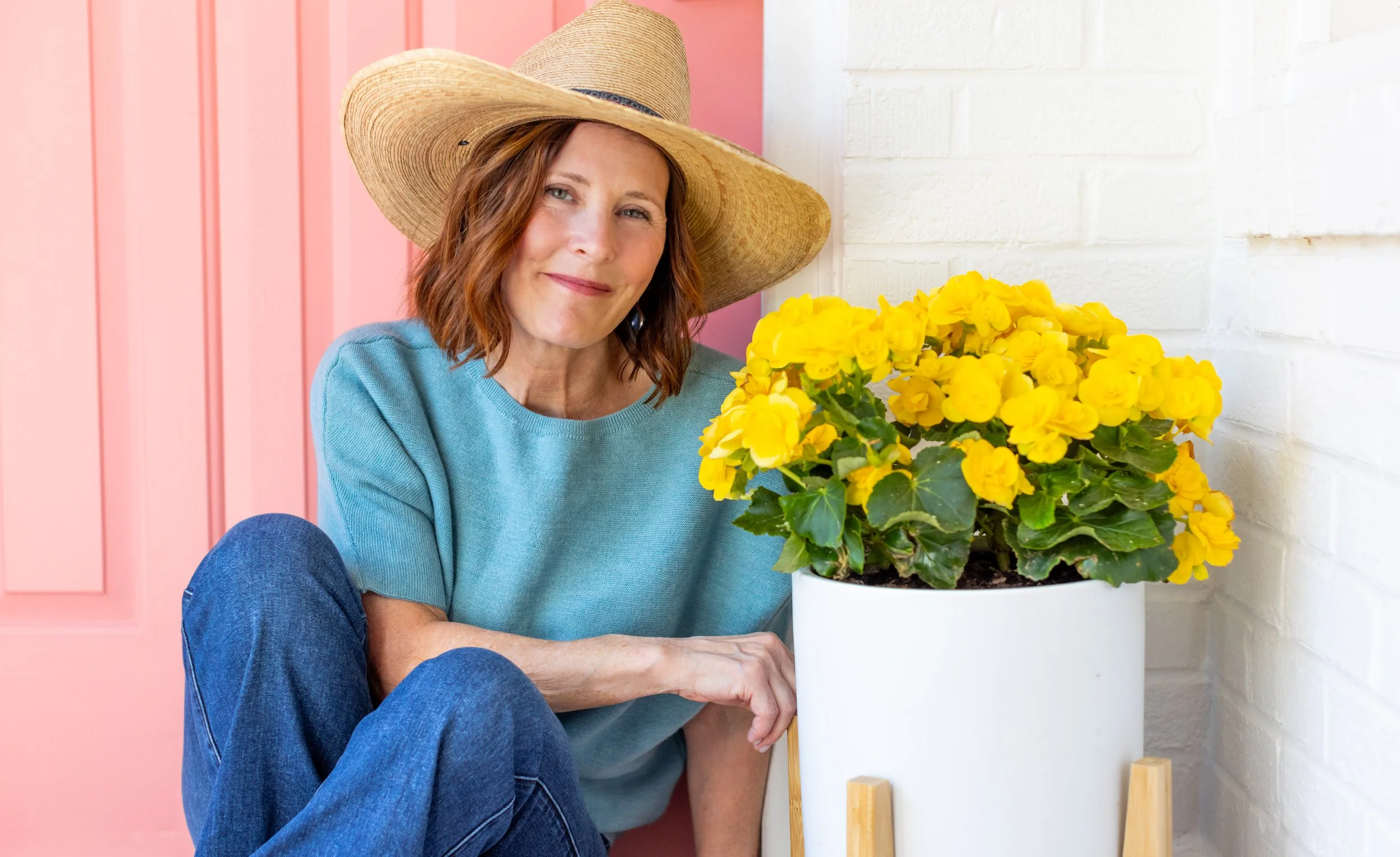 Ann Zalla, artisan pastry chef crafting edible flower cookies and confections in Charleston studio
