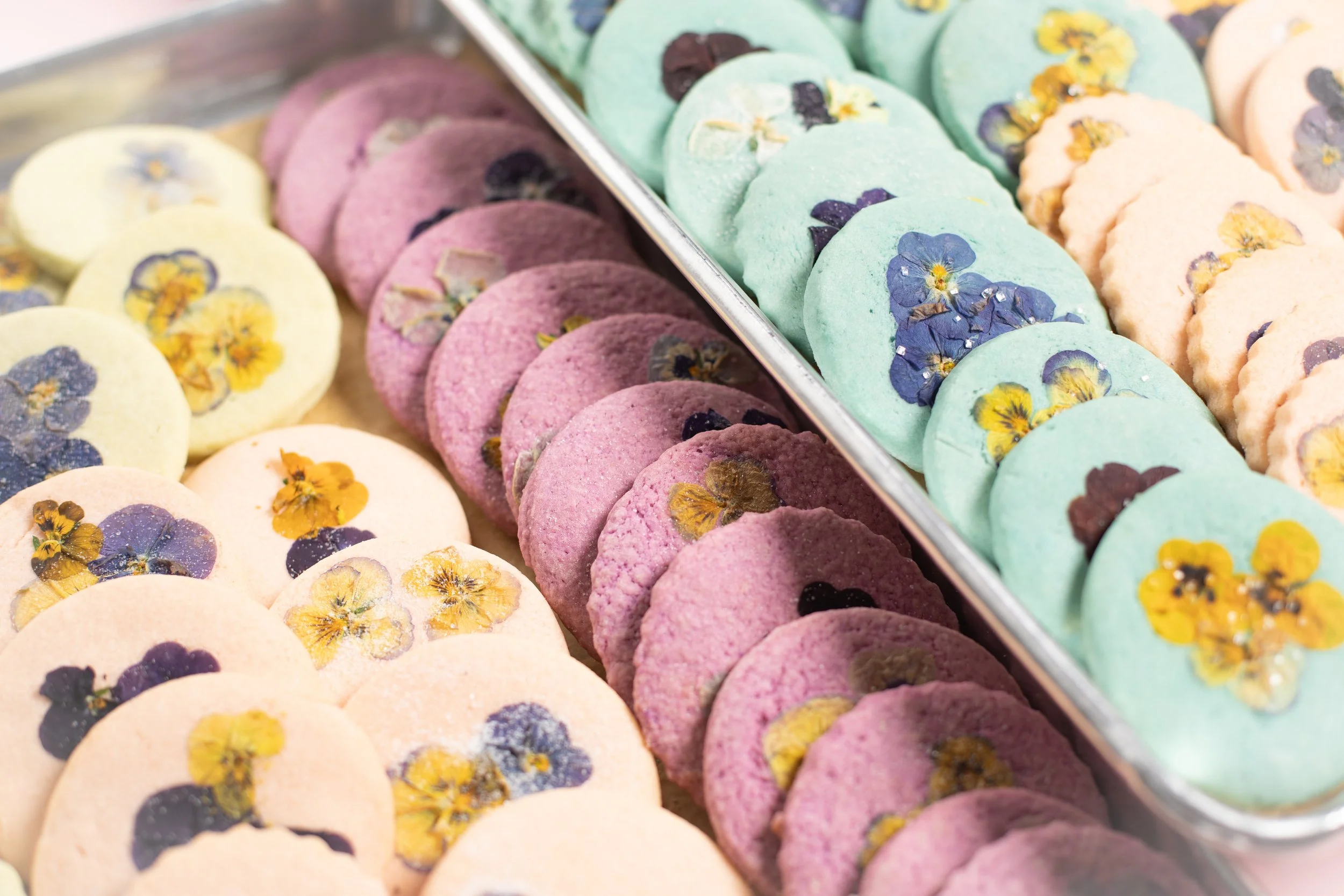Artisanal flower pressed cookies from Charleston pastry studio—perfect for weddings, bridal showers, private events, and local corporate gifting