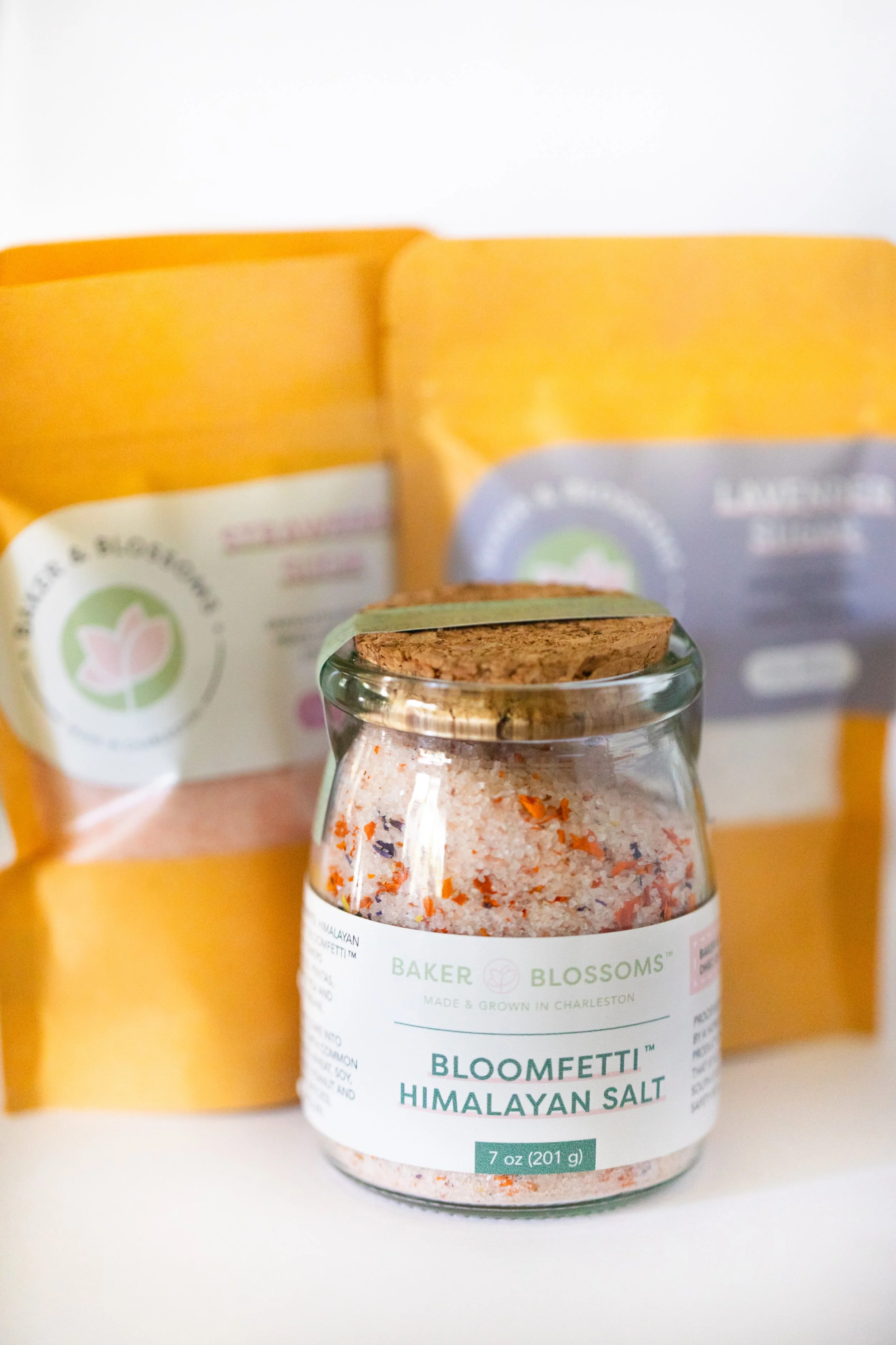 Edible flower infused Himalayan salt and botanical flavored sugar from Charleston pastry studio—available for wholesale to local shops and gourmet retailers