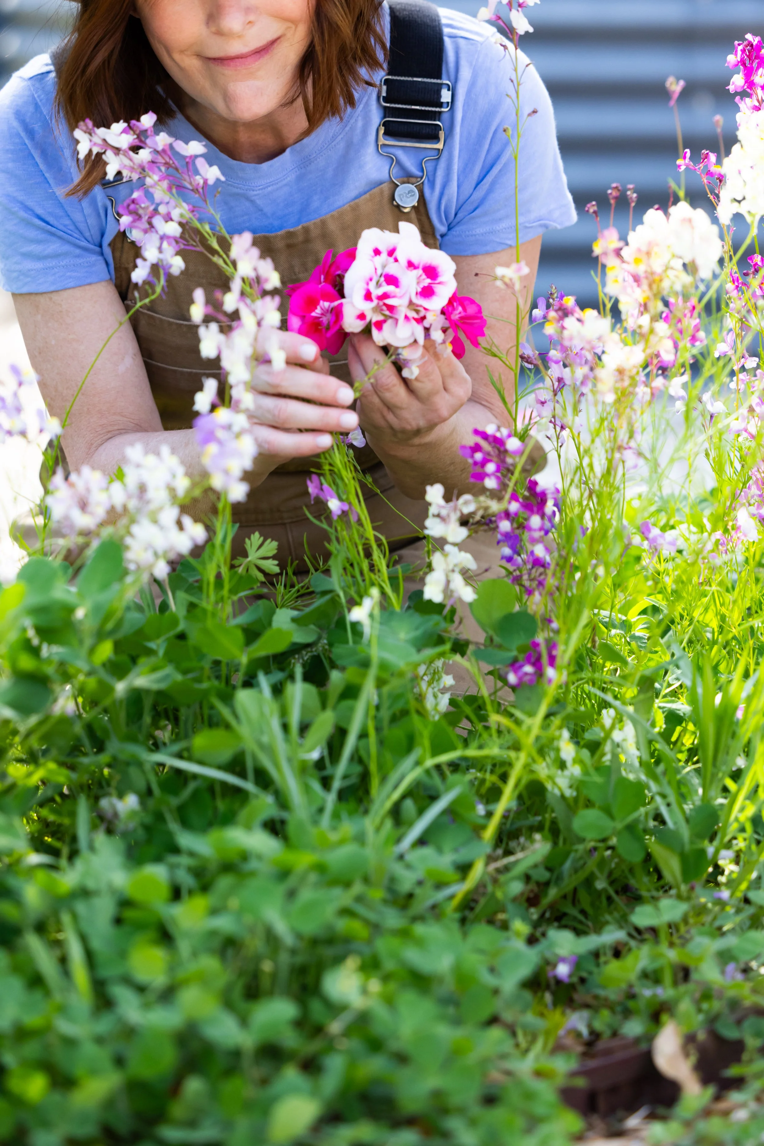 Edible flower and herb garden at Charleston pastry studio—locally grown ingredients used in artisanal cookies, lollipops, and infused sugars