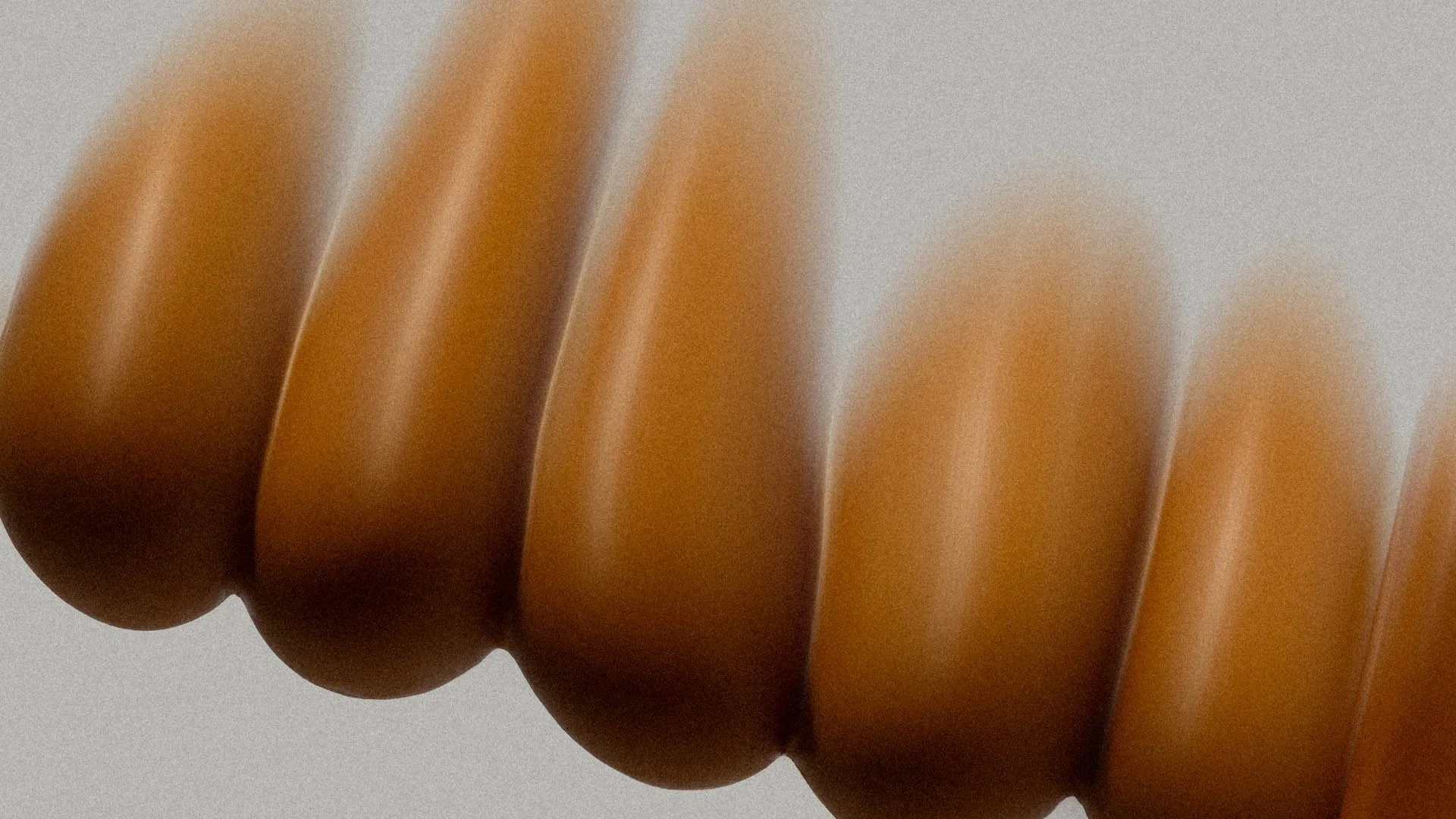 Una espiral de caramel o dulce de color marrón.