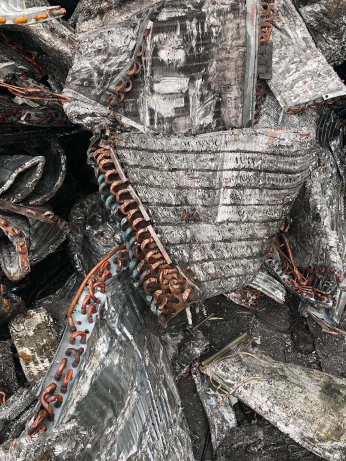 Aluminum copper radiators prepared for scrap metal recycling