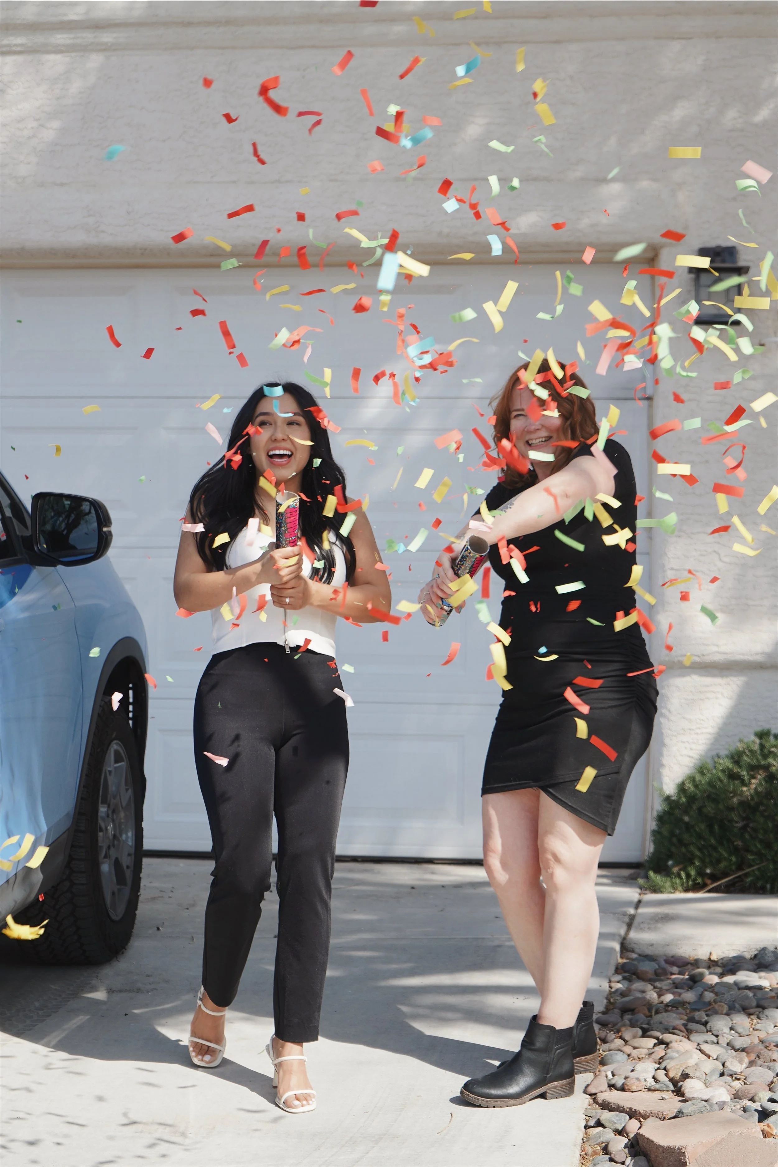 Kat Archila and her client celebrating
