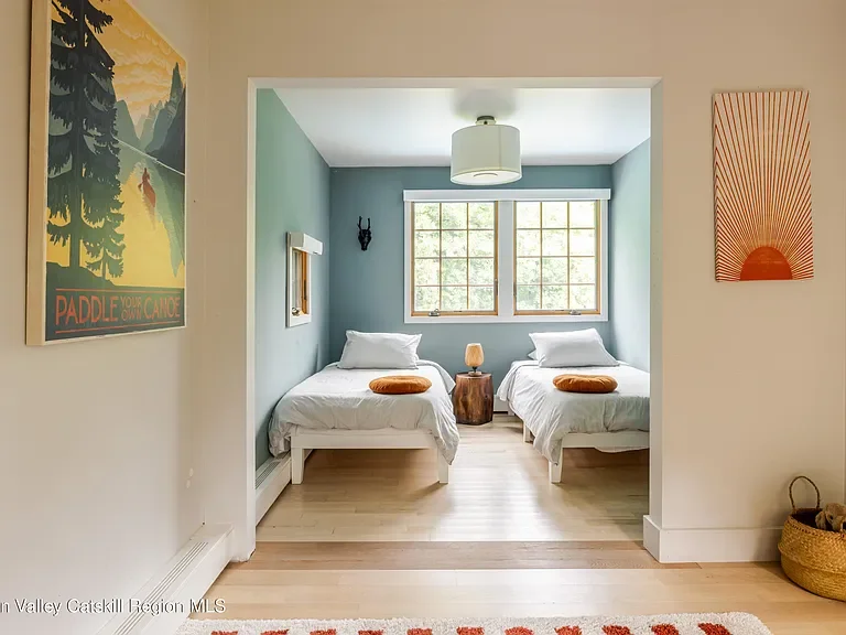 The Fox Chase bedroom features a perfect place to work remotely.
