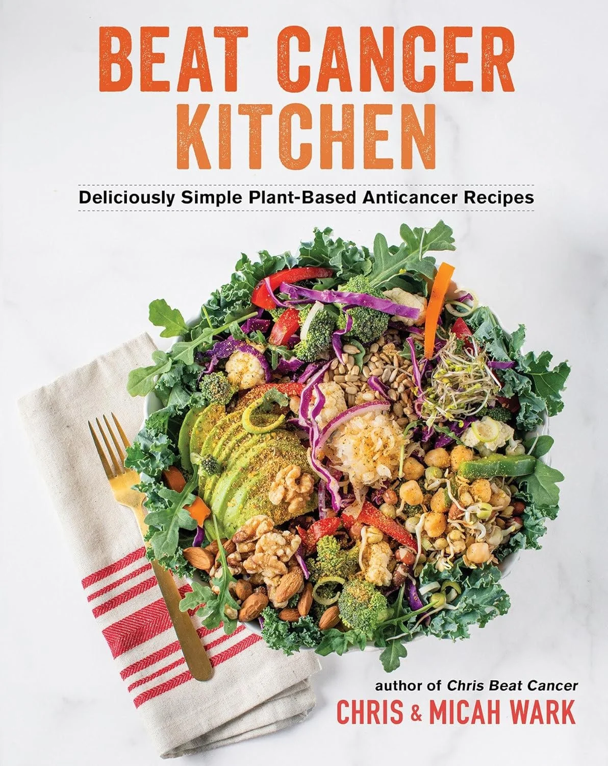 Book cover titled 'Beat Cancer Kitchen' featuring a colorful plant-based salad with vegetables, seeds, and avocado, placed on a white napkin with a gold fork.