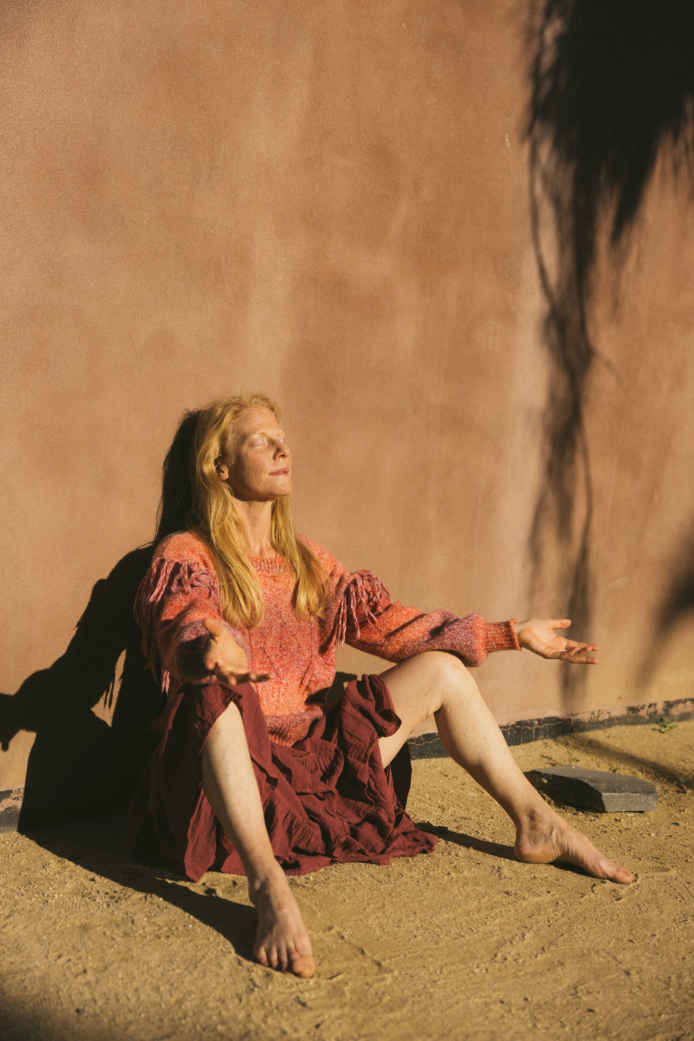 Claire of Primal Devotion offering embodied healing through Earth Tantra, movement, breath, voice, and conscious connection.