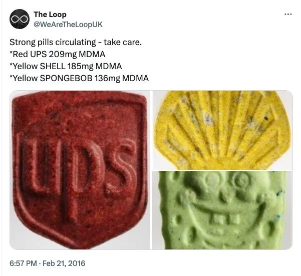 Image of three colorful pills shaped like a red badge, a yellow shell, and a green smiley face, with text warning about strong pills containing MDMA.