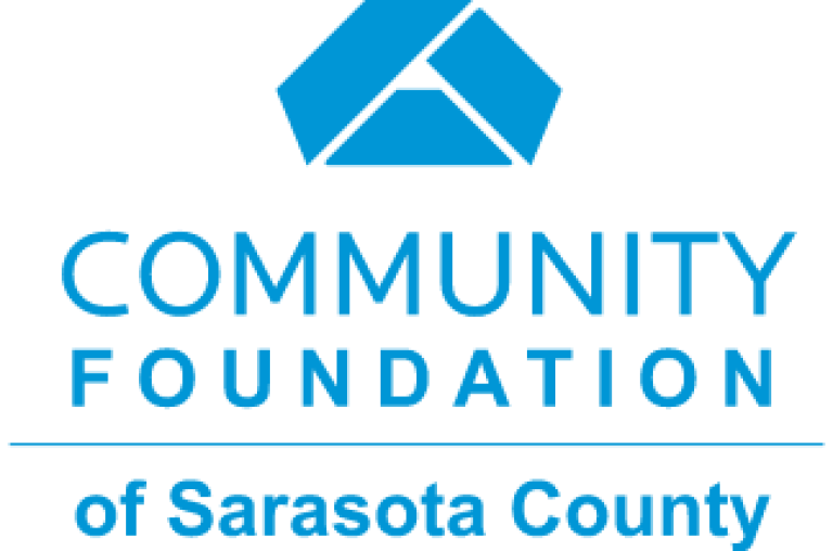 Logo of the Community Foundation of Sarasota County with a blue geometric shape above the text.