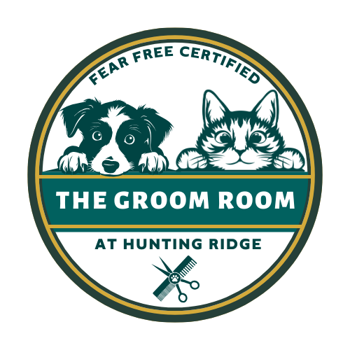 Logo for The Groom Room at Hunting Ridge pet grooming business with dog and cat illustration and fear free certified badge