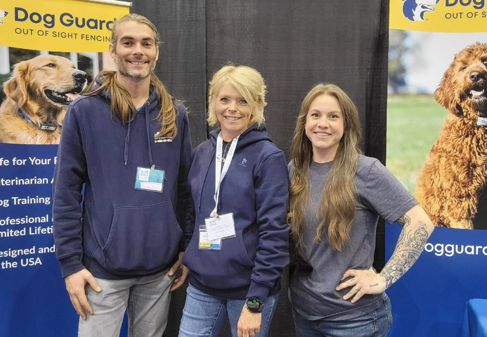 Three Dog Guard of Ohio team members standing together, representing local out of sight fencing installation and underground dog fence services
