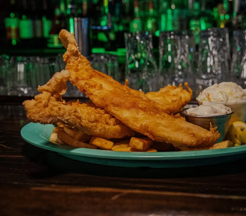 Beer-battered fish and chips with coleslaw at Donovan's Irish Pub & Restaurant.
