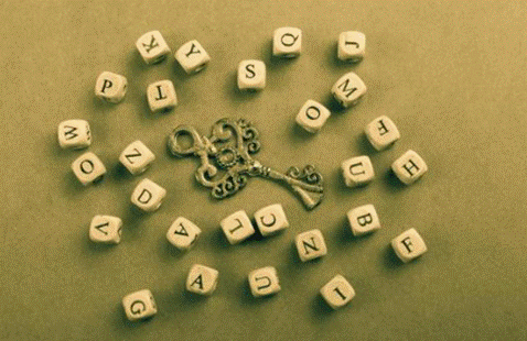 a gold key surrounded by letter tiles
