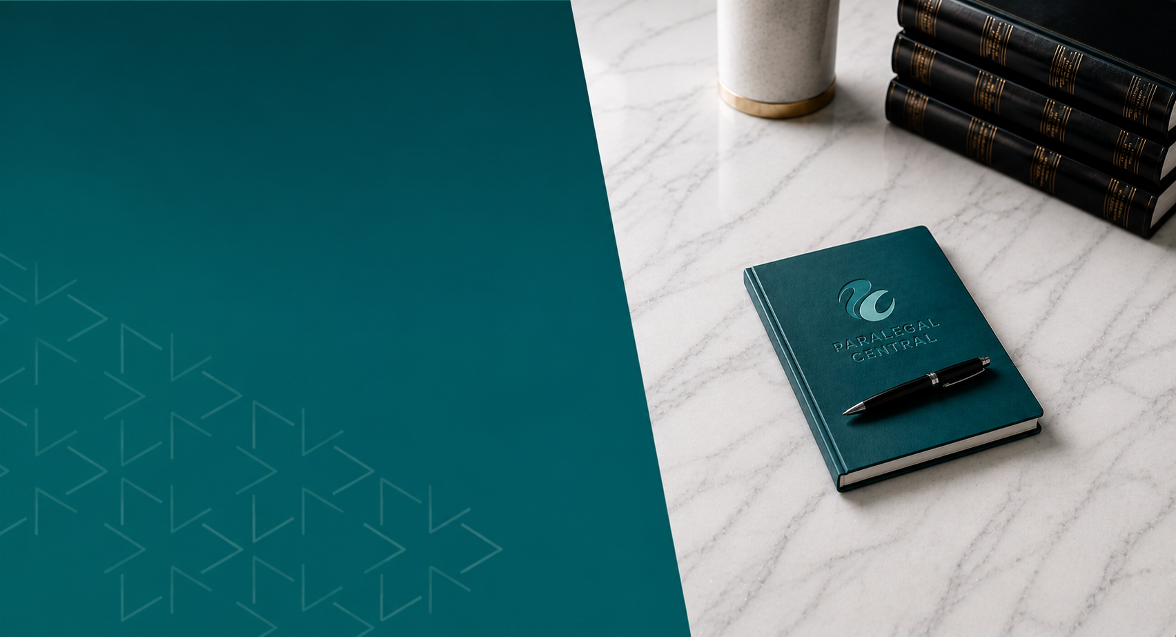 A blue notebook with the words "Paralegal Central" and a logo on the cover, placed on a white marble surface, with a black pen on top. To the right, a row of black books with gold accents and a ceramic cup in the background.