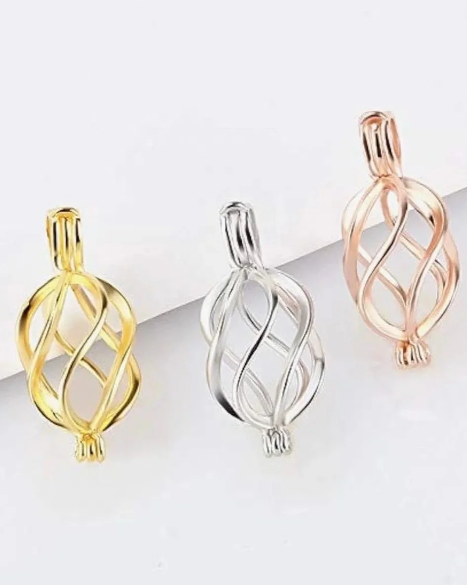 Three decorative metallic keychain ornaments in gold, silver, and rose gold colors, hanging on a white background.