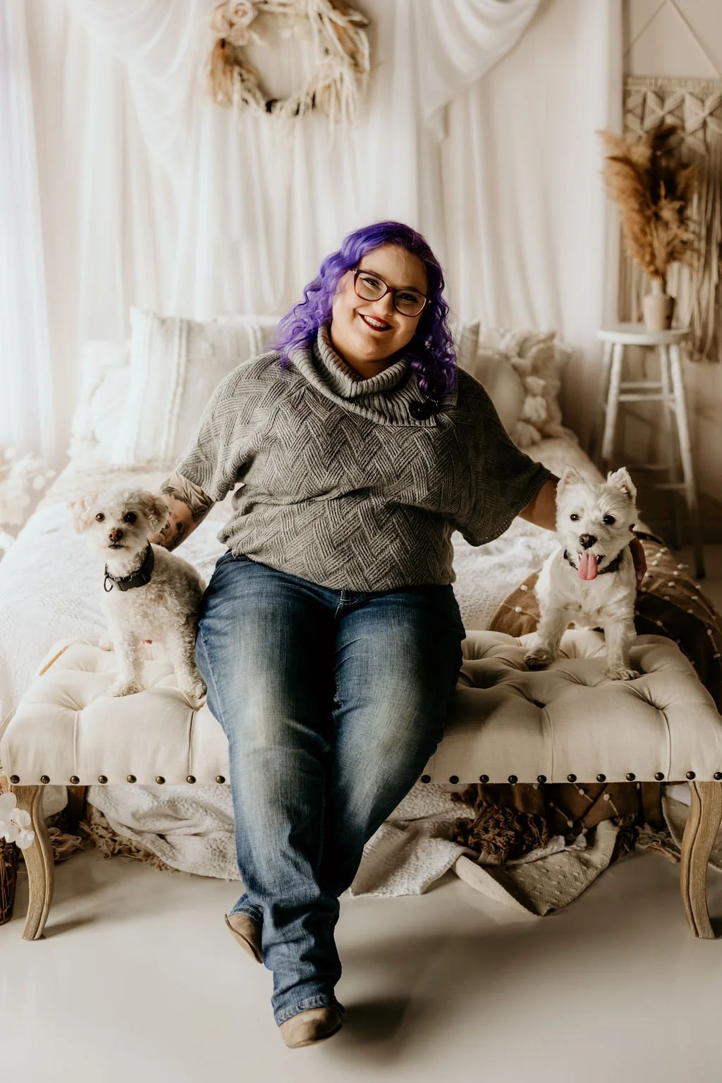 A picture of Jessica Allen sitting on a white bench with Riley on her Left and Westley on her Right ( as you're looking at her). Animal-Assisted Therapy. PTSD. Trauma Therapy. ADHD. Autism. SPD. anger, anxiety, and or depression.
