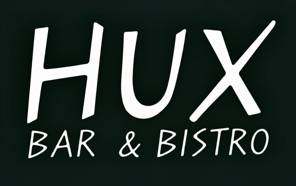 Sign for HUX Bar & Bistro on a dark background.