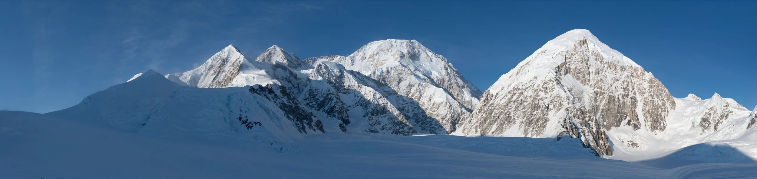 Denali (center), Kahiltnas West (right), route continues up glacier to left.
