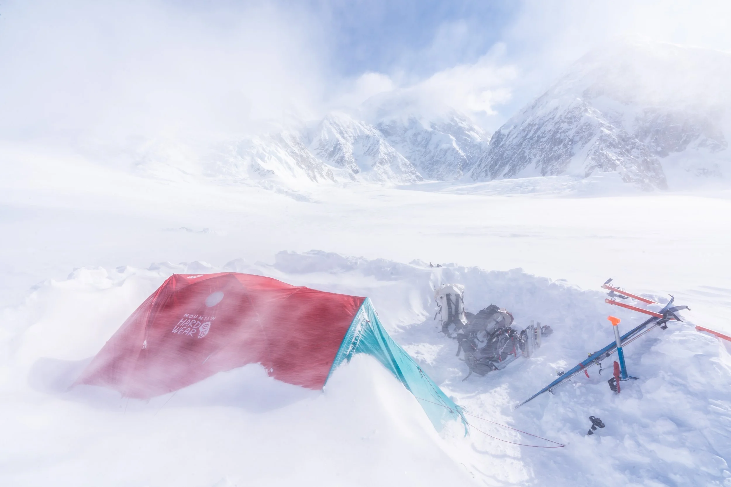 Winds tearing across the lower glacier, slowly burying our tent in snow.