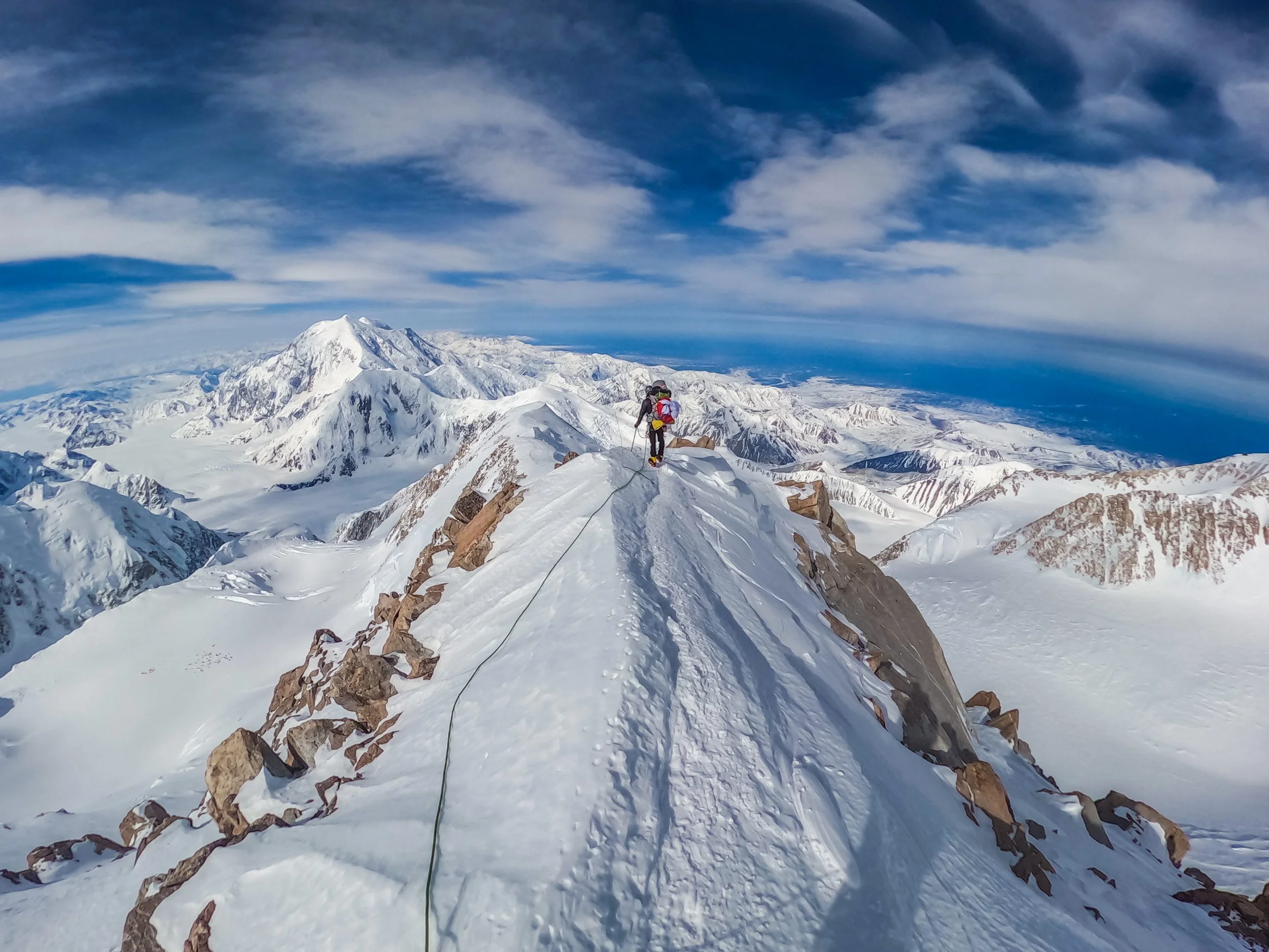 Sam on the 16k ridge with Foraker in the background.