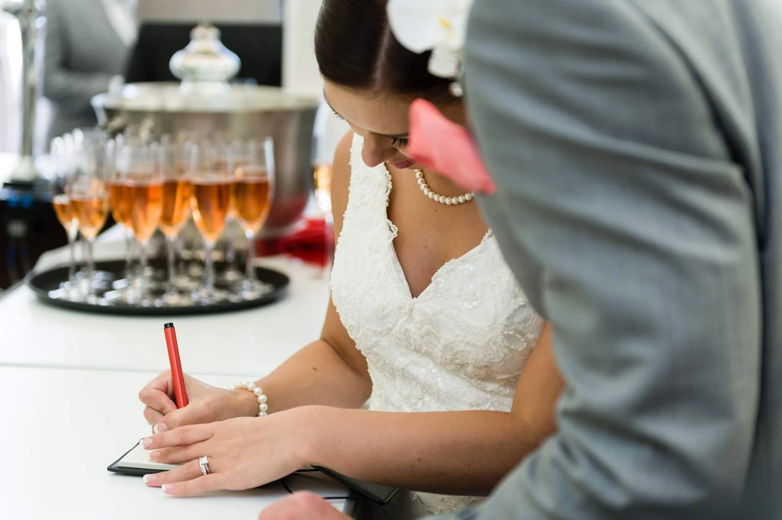 The couple writing down a secret thought