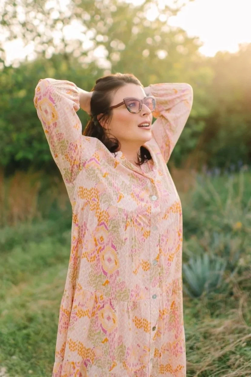 Joann Chevaillier outdoors moving her body during a Somatic Experiencing Therapy session in Fort Worth, Texas.