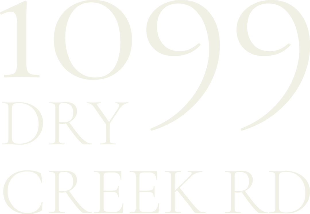 Large white text on black background displaying the year 1099, the word DRY, and the address CREEK RD.