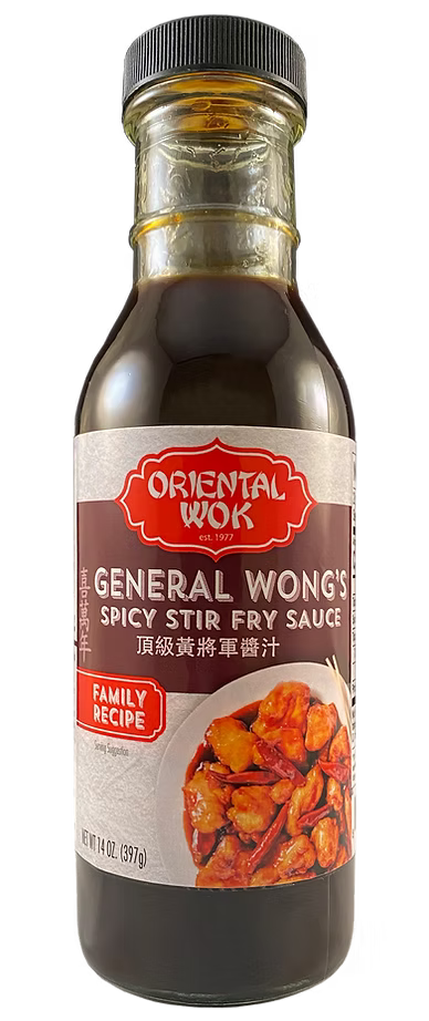 A bottle of Oriental Wok General Wong's Spicy Stir Fry Sauce with a picture of stir-fried chicken and vegetables on the label.