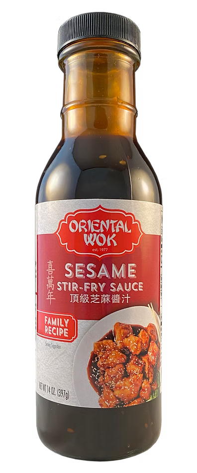 Bottle of Oriental Wok Sesame Stir-Fry Sauce, 14 oz, with an image of a prepared stir-fry dish on the label.