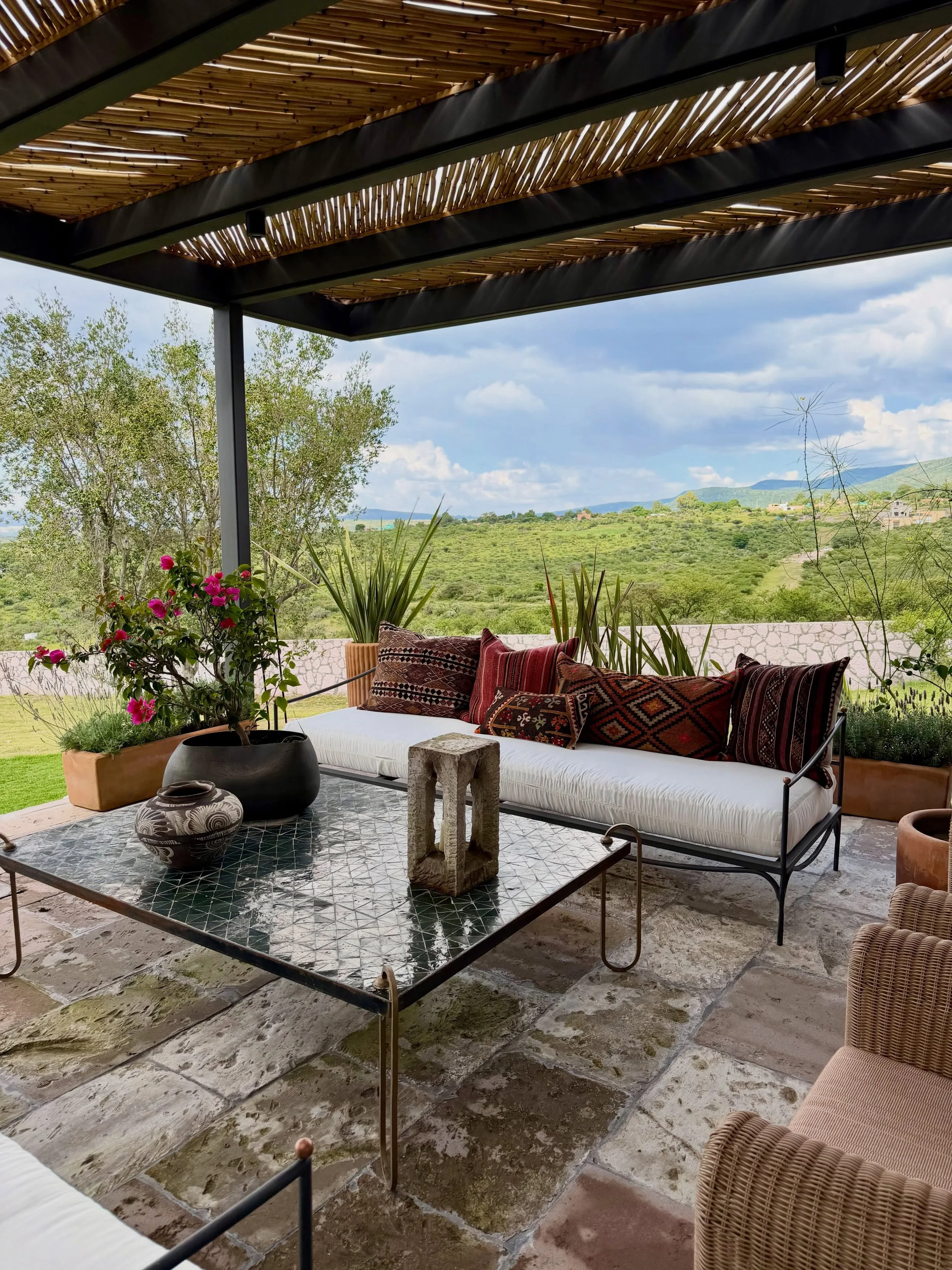 Casa Bego&ntilde;a got a major upgrade with this beautiful bamboo feature, laid in a chevron pattern across the pergola. While we finalize the sofa upholstery, these kilim pillows added just the right amount of texture, color, and personality to the 