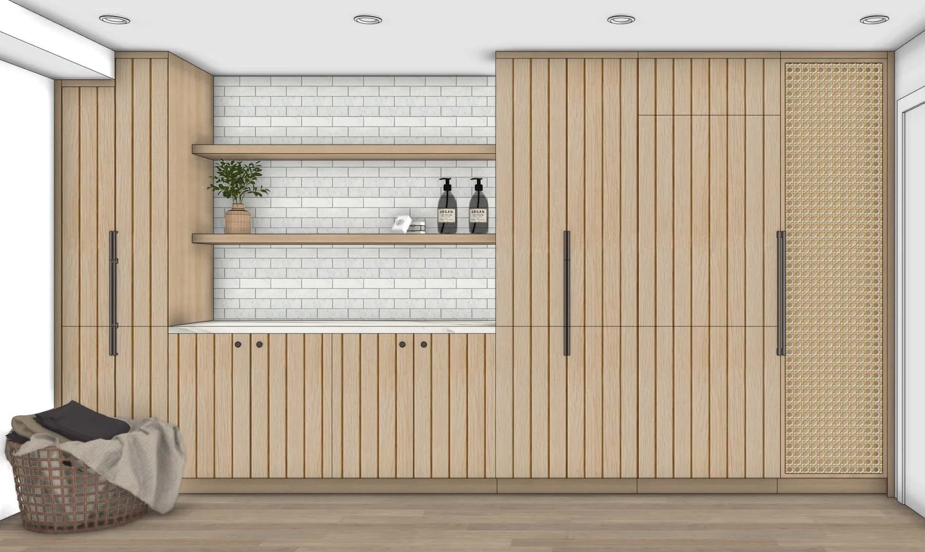 Interior view of a modern room with a light wood-paneled wall, a nook with a white brick background, and two floating shelves holding a potted plant and soap dispensers. To the right, there are two large sliding doors with black handles. A laundry basket with clothes is placed at the bottom left corner of the image.