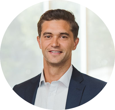 Realtor Trent Meacham smiling in a professional setting.