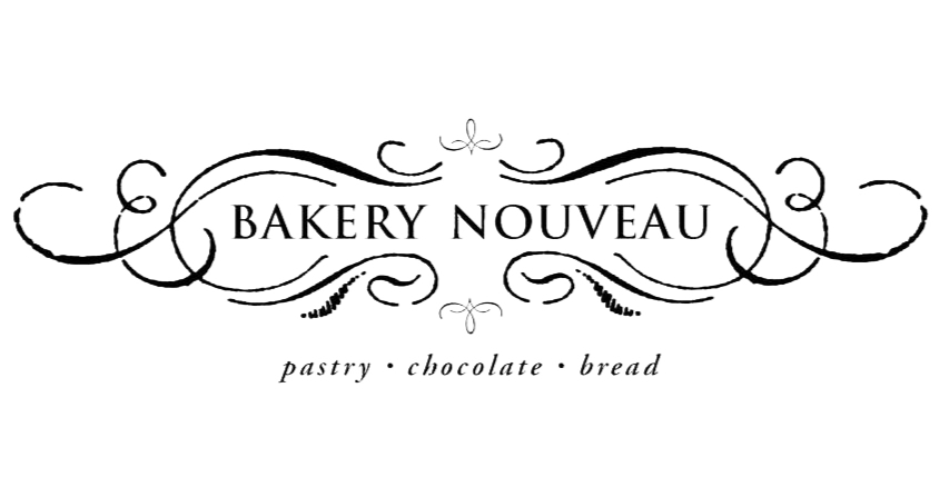Bakery Nouveau logo featuring elegant scroll flourishes, an award-winning independent pastry, chocolate, and bread bakery in West Seattle