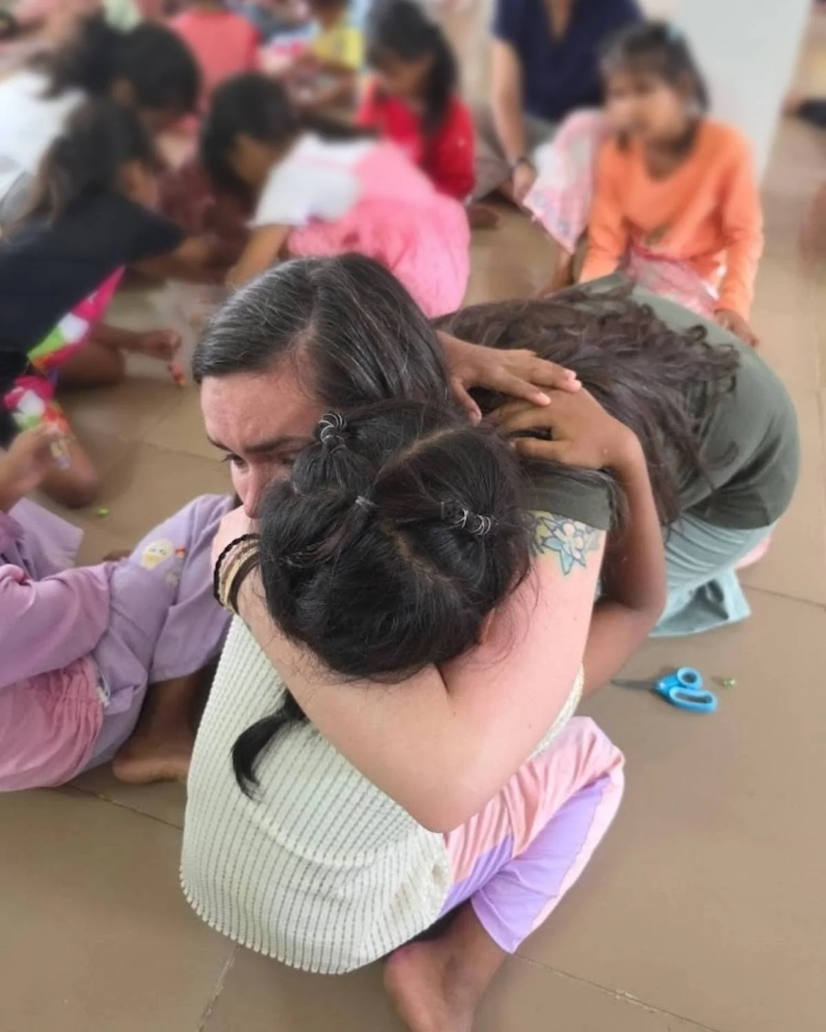 Heart mother hugging her heart daughter